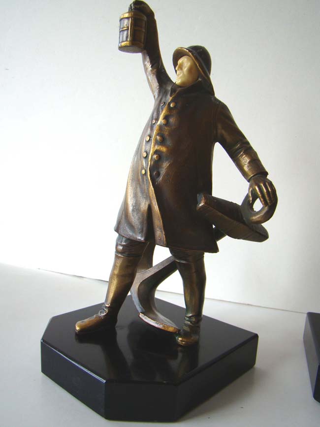 A wonderful pair of Antique Bookends circa 1931 depicting a sailor holding a lantern — image 2